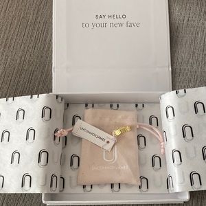 New Uncommon James gold textured ring Size 7 with full packaging